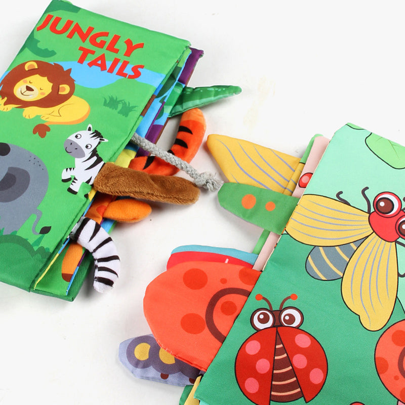 Baby grabbing giggling at soft 3D animal tails in fabric book 🐘 | Textured sensory play builds tactile discrimination