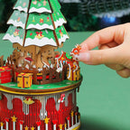 The assembled wooden music box displayed as a charming holiday decoration in a cozy home setting