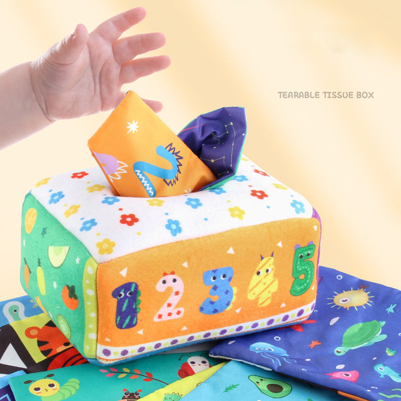 Baby exploring crinkle sound with sensory toy, stimulating auditory development and curiosity