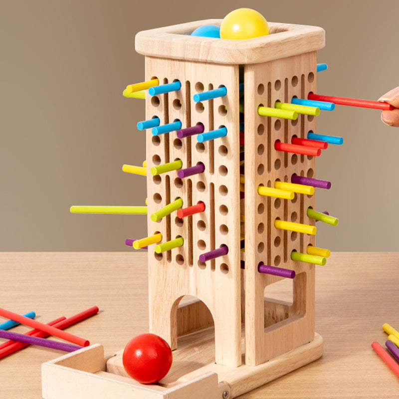 Wooden tabletop stick-pulling game with colorful dice and balancing ball for kids and families