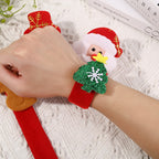 The soft flannel Christmas slap bracelet being worn on a person's wrist