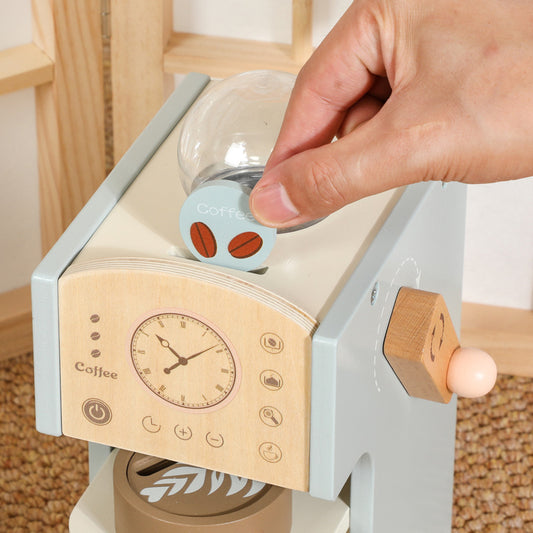 Toy espresso machine with pressable milk frother and wooden coffee pods