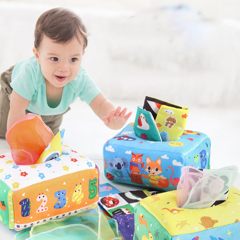 Montessori-inspired tear-proof tissue box toy for babies, designed to boost sensory development and satisfy pulling curiosity
