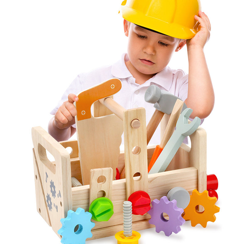 Toddler role-playing as a little engineer using wooden tools