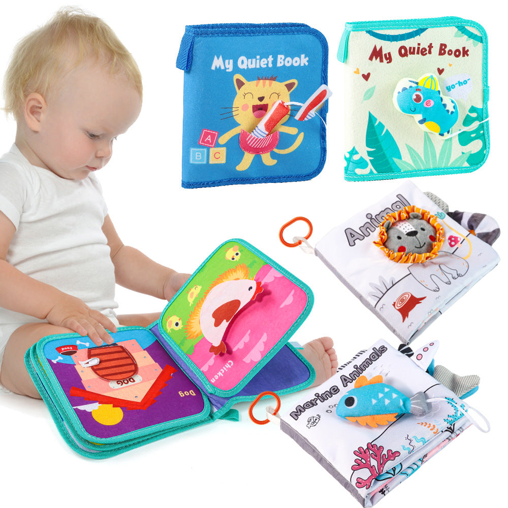 Fabric busy book clipped to stroller for on-the-go toddler play during travel or tummy time