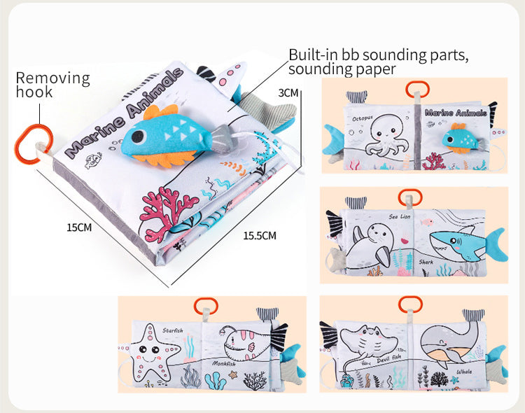 Fabric busy book clipped to stroller for on-the-go toddler play during travel or tummy time