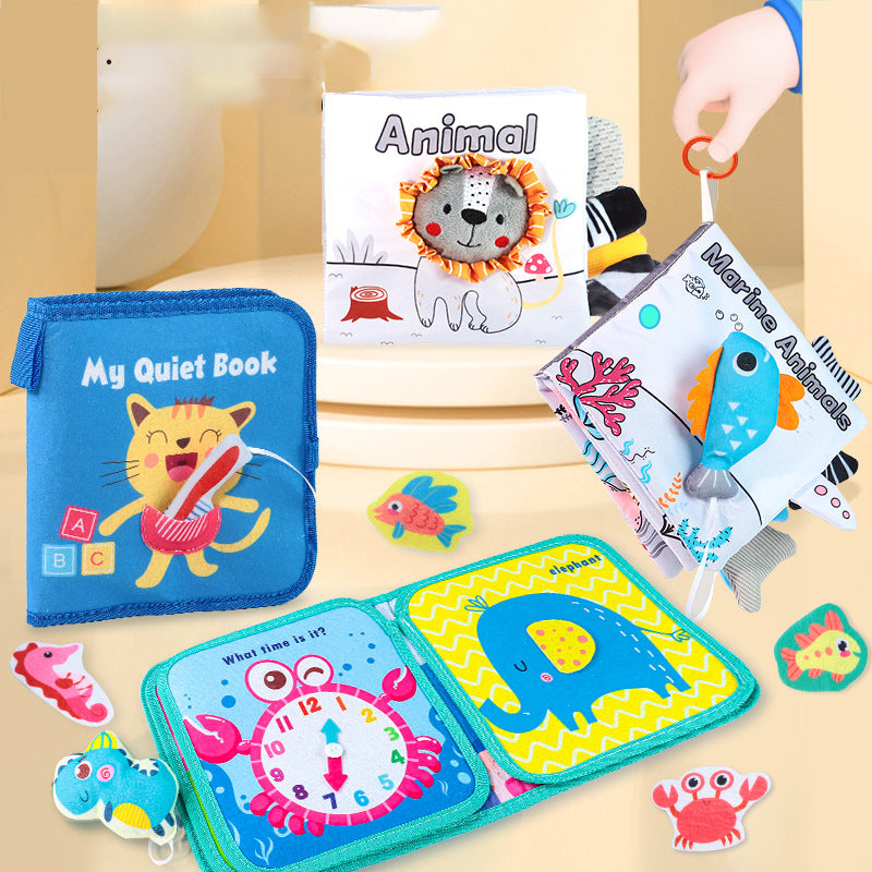 Fabric busy book clipped to stroller for on-the-go toddler play during travel or tummy time