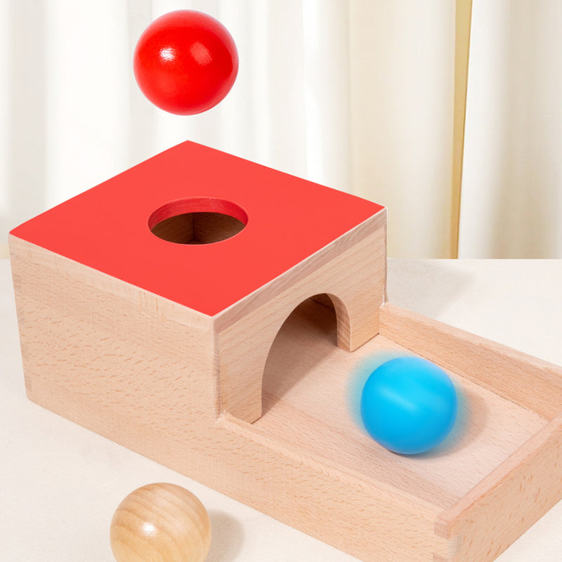 Wooden Montessori toy with ball drop activity for focus and coordination training